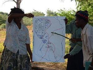 Dr. Jasse conducting public lecture on importance of bats and rehabiliation of degraded mines shown on the map