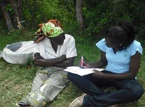 Caroline interviewing a fishmonger at Koguta.