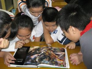 School children enjoy the program on bird indentification.