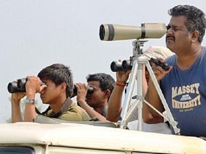 The researcher with assistants collecting data on swamp deer.