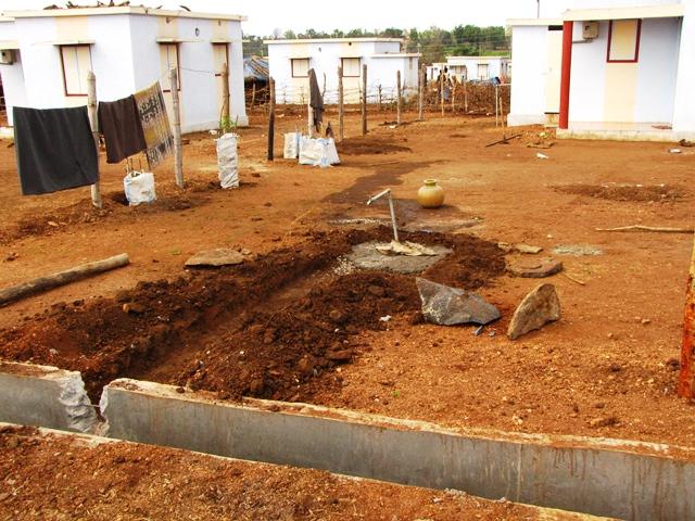 Construction underway in a relocation colony outside the reserve.