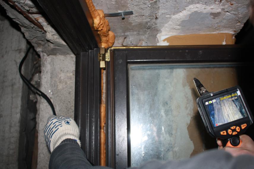 Investigating attic with bats in Derzprom building.
