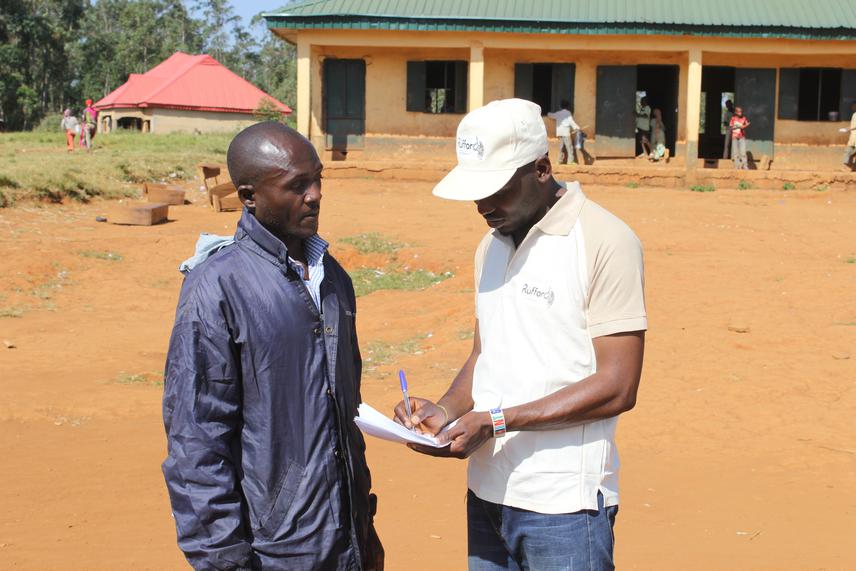 Biplang Yadok administering a questionnaire to a resident of Yelwa Village, Taraba State, Nigeria.