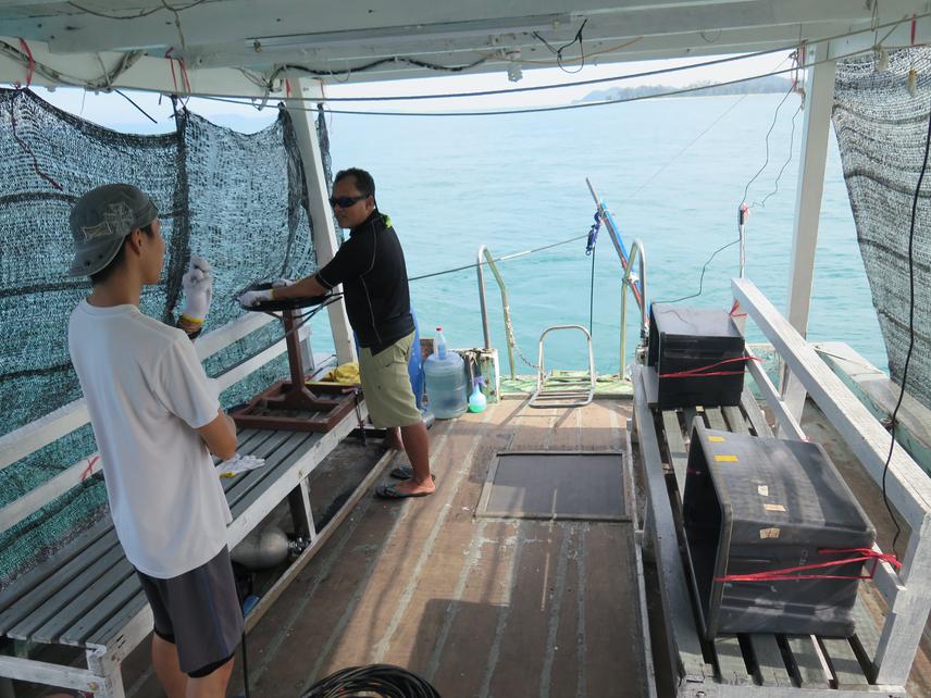 Part of the survey team at their respective positions for the seagrass survey – positioning the underwater camera, monitoring and recording the underwater seagrass