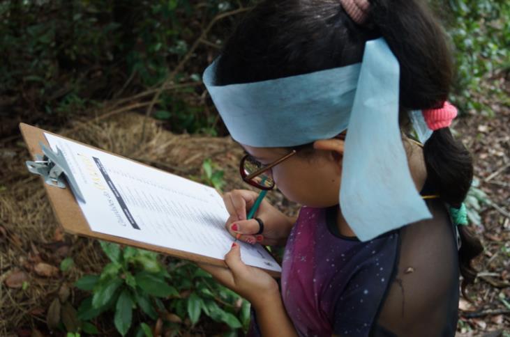 A local kid engaged in practical activity of the workshop in the Paraiba mine site.