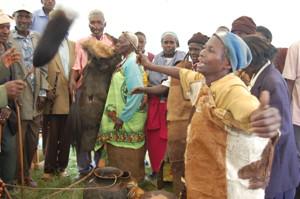 Community member leading a traditional song