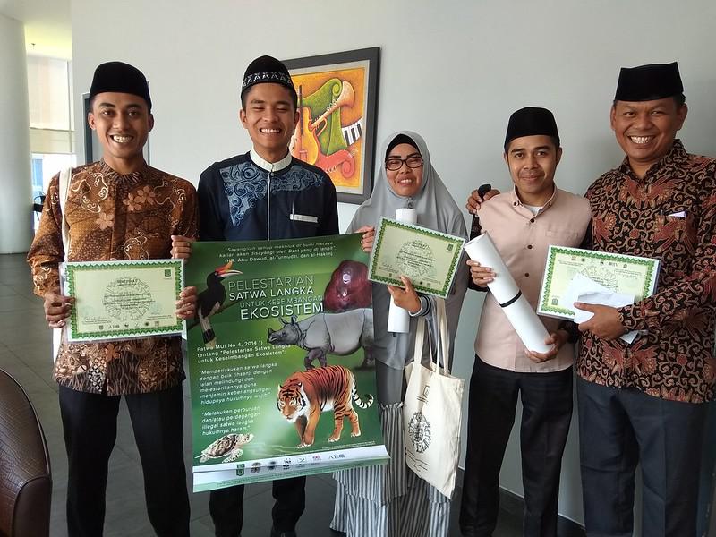 Participants of conservation clerics happy to accept certificate after the training.