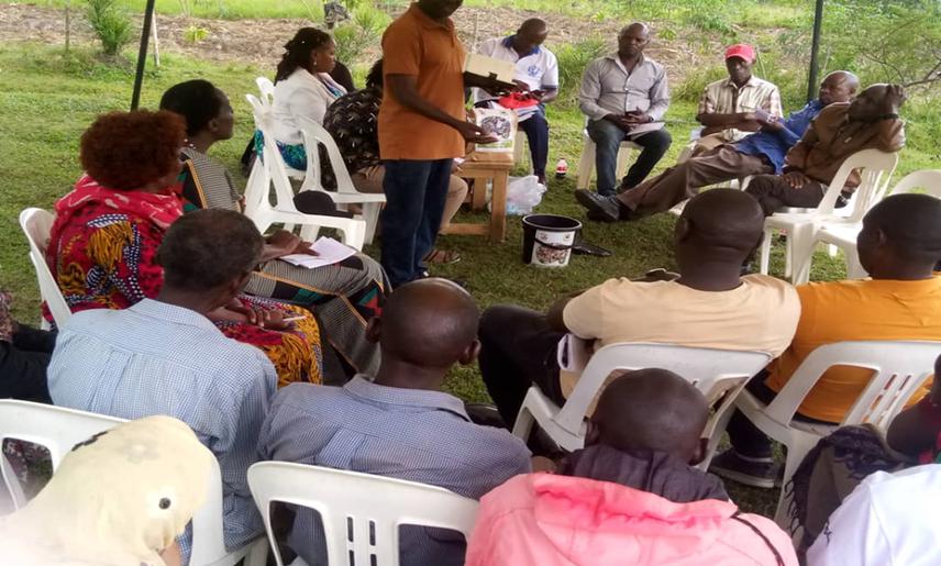 Participants being taken through integrating black soldier fly larvae as alternative fish feed.