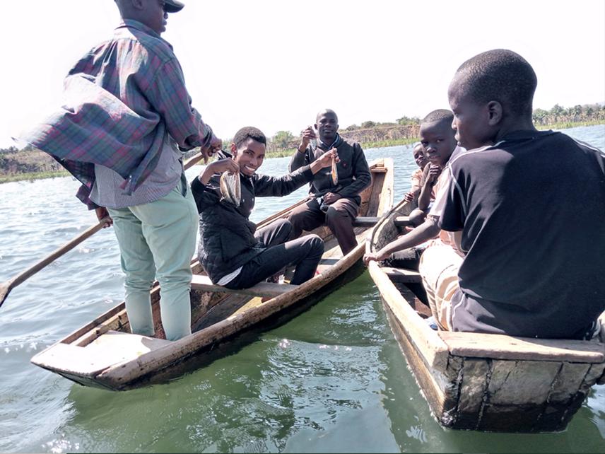 Mr. Umbayda and Dr. Nehemia with villagers fishing in Ilagala. © T.Umbayda,2023.