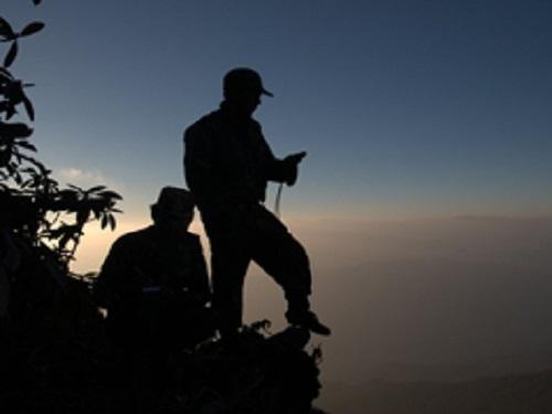 Recording the information of gibbon songs at listening point.