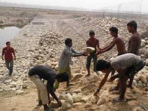Spur construction at Rapti river to protect from flood.