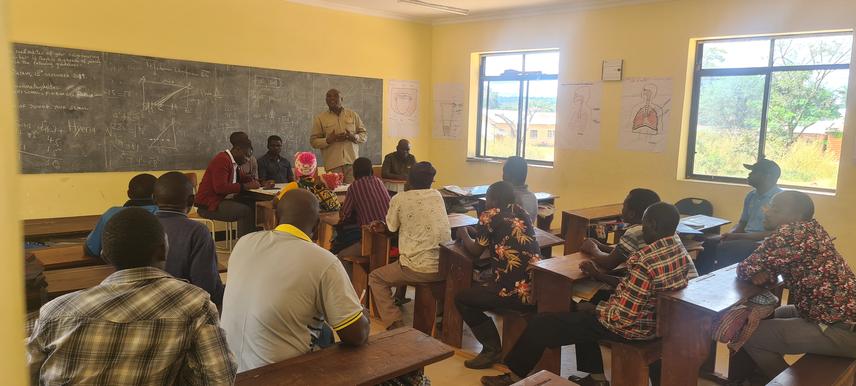 A workshop held in Ikusi Village to educate local beekeepers about sustainable beekeeping practices. ©Baraka Naftal.