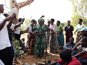 Partcipants trained on propagation of improved fruit (citrus & mango) trees celebrating during the field demonstrations