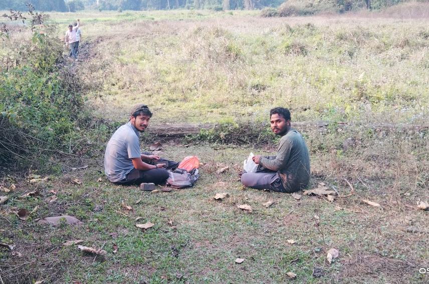 Checking trail cameras in the field, Jyotish and research assistant Ankur Nahok during a survey in the forests of Assam. @Mridul Saikia