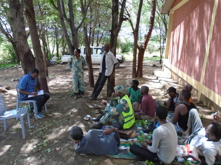Discussing human-elephant interactions and conservation priorities with rangers and local community representatives. © Ahmed M. Abachebsa