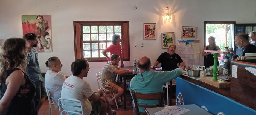 Fishers gather to discuss fish identification charts during a project workshop, Mar del Plata, Buenos Aires, Argentina. (c) Manuela Funes