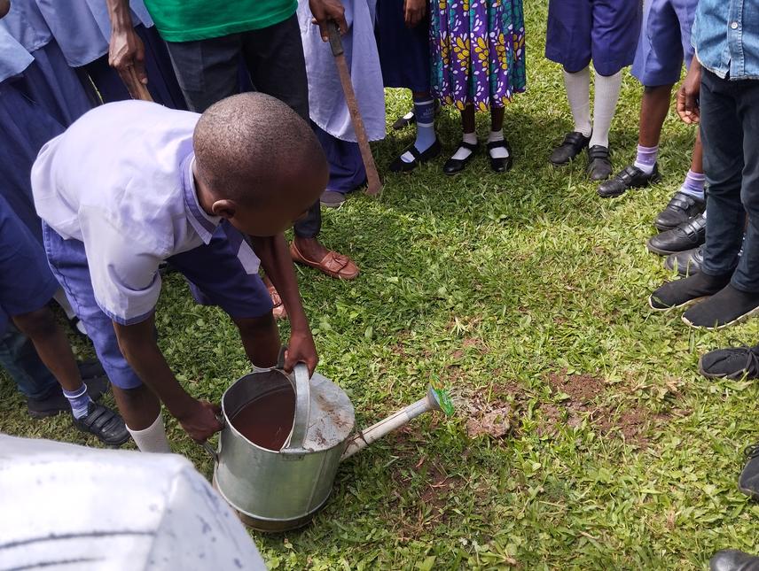 Tree planting by a pupil. ©Farhan Moshood.