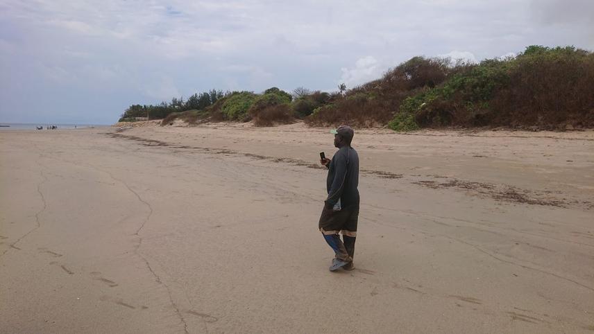 Patrol guide conducting routine monitoring of sea turtles, their nests, and anthropogenic impacts © Steve Mtalii