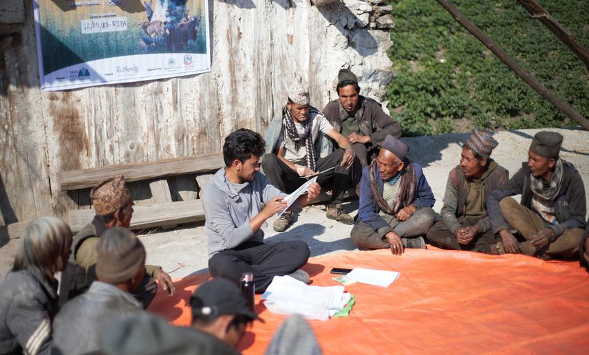 The principal investigator (PI), engaging with locals during a workshop held in Ripa village, highlights the importance of community-based conservation efforts. © Anup Raj Shahi.