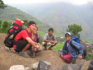 Some team members resting during trek back to the settlement.