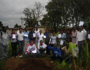 Well trained volunteers holding their teaching manuals.